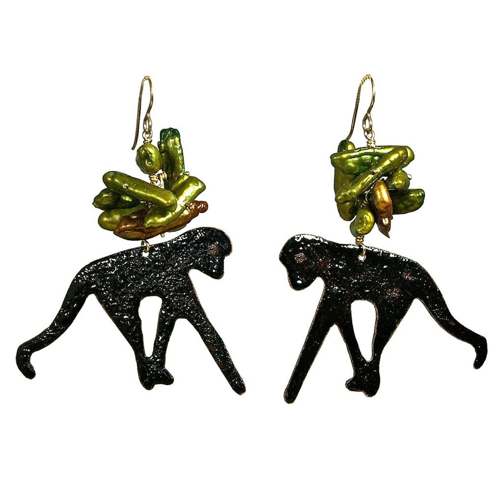 A pair of unique earrings featuring monkey silhouettes with colorful bead accents on top.